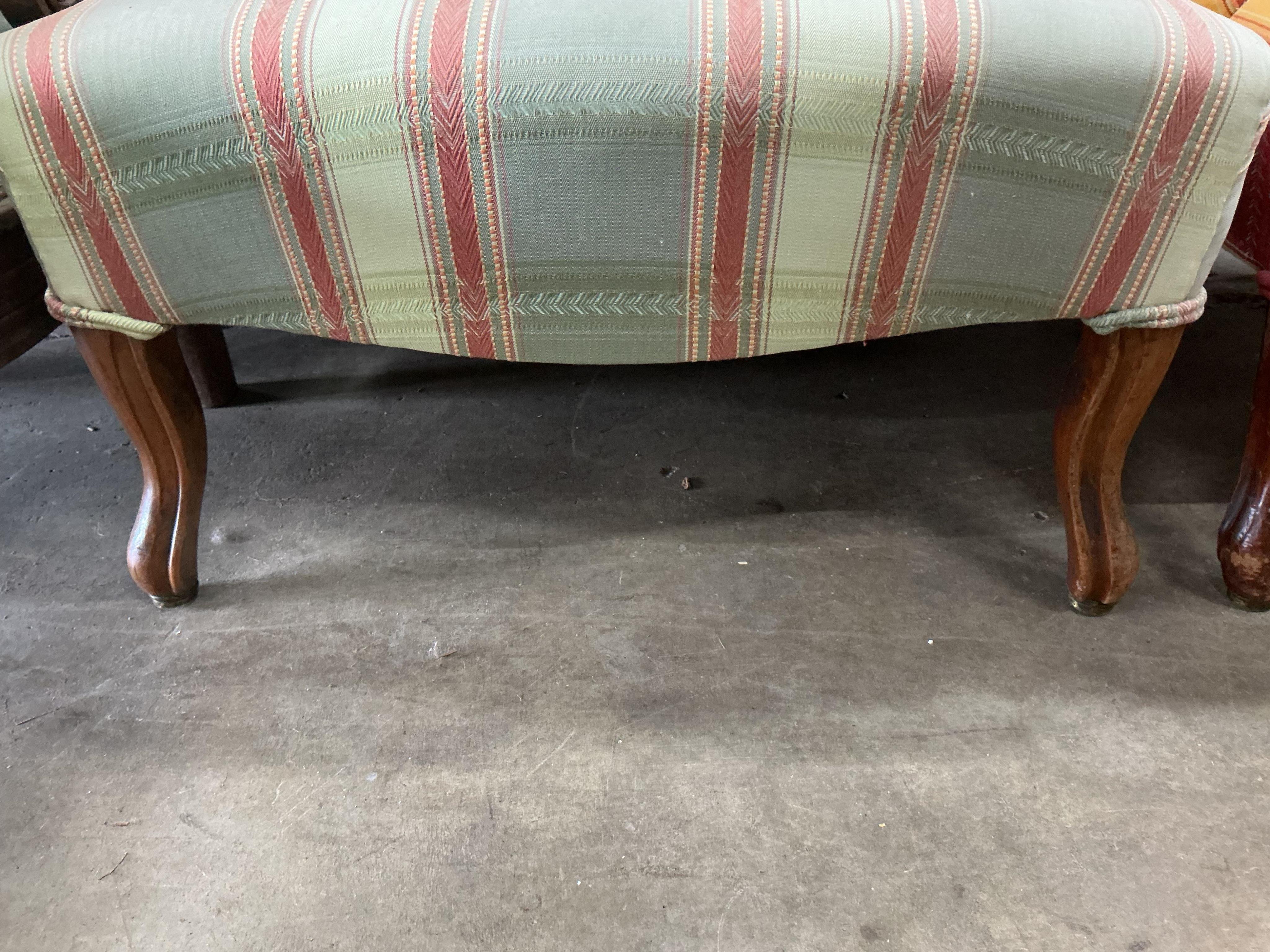 A pair of late 19th century upholstered mahogany nursing chairs, width 58cm, depth 50cm, height 70cm